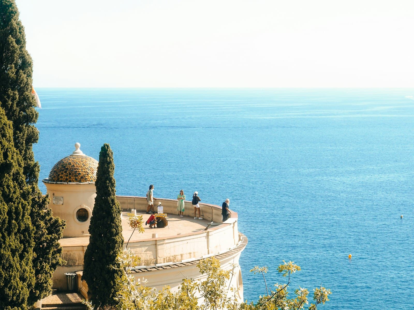 A sunlit terrace above the Mediterranean
